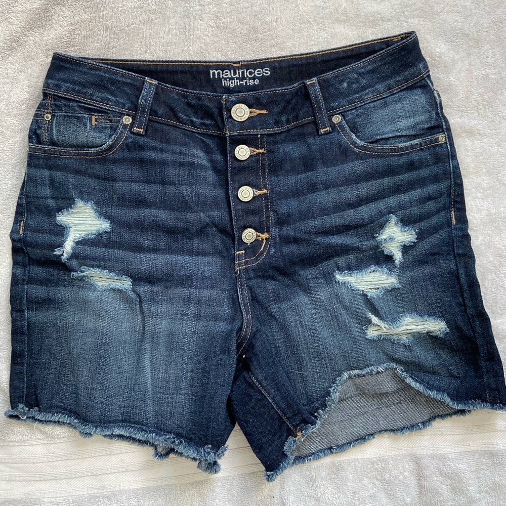 Dark blue ripped denim jeans